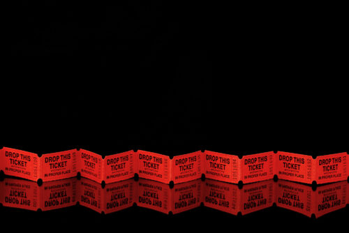 Red tickets on black